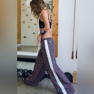 FREE PEOPLE MOVEMENT OVERTIME FLORAL TRACK PANT